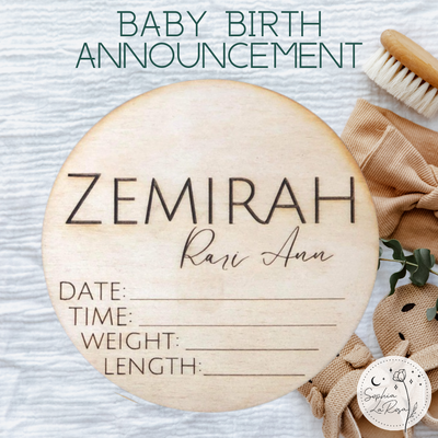 A custom engraved wood round that says Zemirah Rari Ann and a spot to write birth date, time, weight, and length