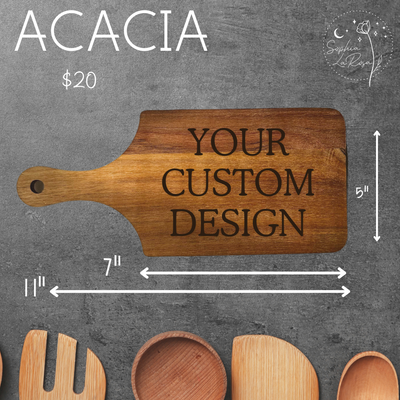a graphic that shows a mockup of a laser engraved acacia cutting board which measures 5" x 11" with the handle.  