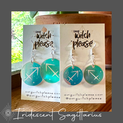 Round Iridescent Acrylic Earrings with an astrological symbol for Sagittarius on a business card that says OMG Witch Please