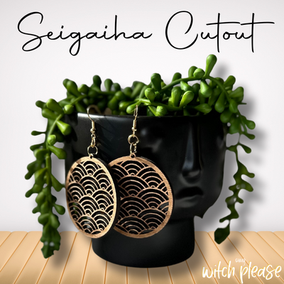 Laser-cut wooden earrings with a Seigaiha Japanese Wave design