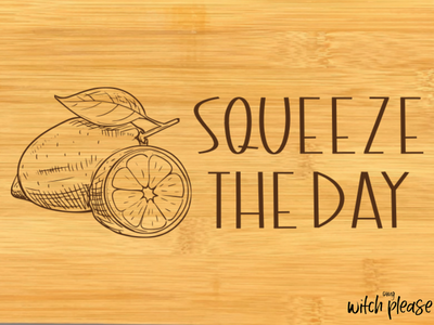 Lemon illustration with Squeeze the Day engraved on bamboo