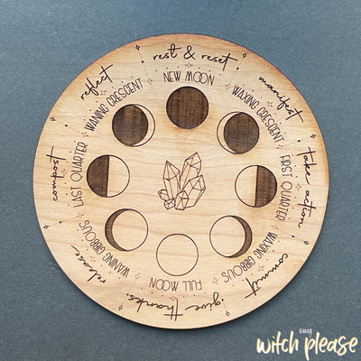 new moon phase board with intentions and crystal design
